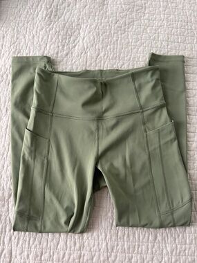 Athleta Olive Green ultimate stash II pocket leggings